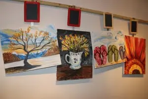 Art works created at eat-Paint-love, on display in the rear of the space. (Photo by A. Rooney)