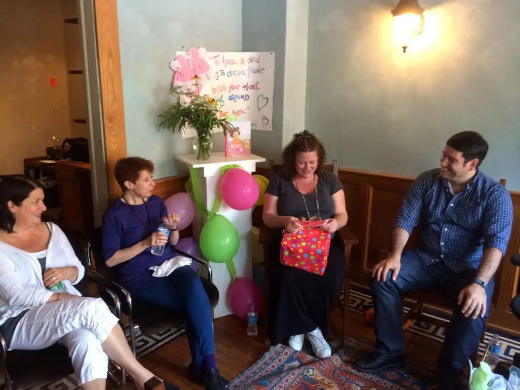 The Paper staff hosted a baby shower for Roots and Shoots columnist Pamela Doan this week. Left to right, Michele Gedney, Liz Schevtchuk Armstrong, Pamela Doan and the father-to-be Mike Casale. (Photo by Kevin E. Foley)
