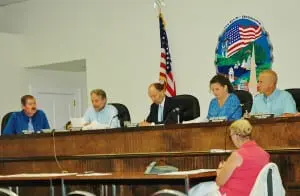 TheâPhilipstownâTownâBoardâreviewsâdocumentsâatâitsâJulyâ10âmeeting.âPhotoâbyâL.S.âArmstrong