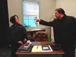 Julie Eads Woolley as Sister Aloysius and Rick Meyer as Father Flynn