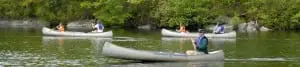Canoe enthusiasts plying the waters of Canopus Lake.