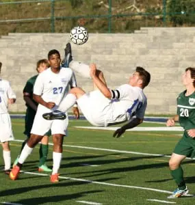 Aidan Draper defies gravity in varsity boys soccer's 2-1 win over Brewster on Sept. 15 at home. Goals were scored by Tucker Hine and Draper.