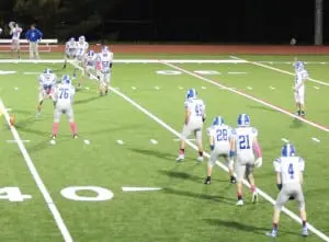 Macdara Heanue kicks off for Haldane at Valhalla on Oct. 10. (Photo by Kim Giachinta)