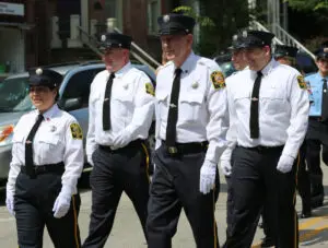 Gordon Stewart, center in the Fourth of July 2013 parade