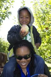 Jaden Myles Council of Queens was able to reach a big one at Fishkill Farms with the help of his mother Ebonie Council (Photo by Kevin E. Foley)