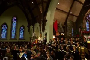 Rachel Evans, concertmaster, leading musicians and singers in The Hallelujah Chorus
