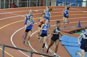 Haldane runners Ruby McEwen, left, Kaitlyn Philips, at top, and Alexandria Sharpley in New York City on Jan. 11.