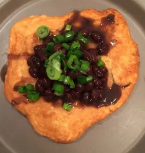 Open-faced fry bread taco