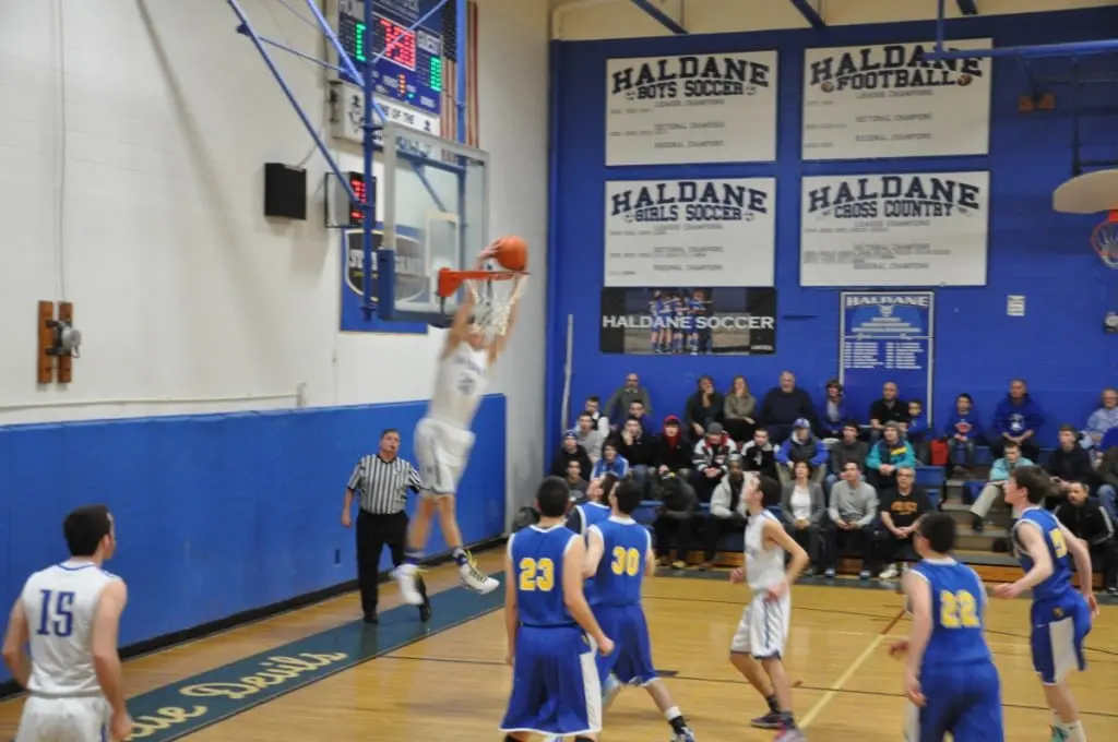 Peter Hoffman scores his 1,000th and 1,001st points of his high school career.