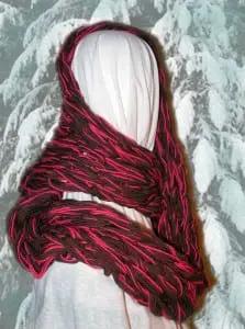 Arm-knitted infinity scarf by Chris Sanders