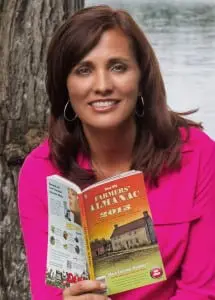 Sandi Duncan, Farmers' Almanac editor, with the 2015 annual edition