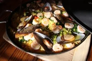 Serve paella in its pan.