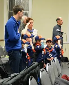 Cub Scouts open the Town Board meeting by leading the Pledge of Allegiance.