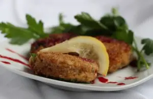 Crab cakes drizzled with beet sauce (Photo by M.A. Ebner)