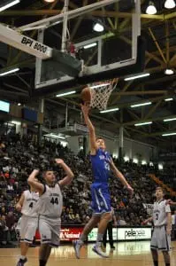 Peter Hoffmann goes strong to the basket in the first quarter of the March 20 final four game.
