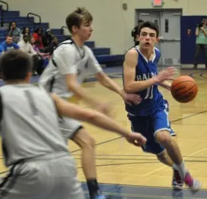 Blue Devils' point guard Tucker Beachek drives to the hoop in the opening minutes of Haldane's victory over the Stony Brook Bears March 13. 