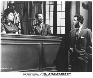 A promotional still from El Analfabeto