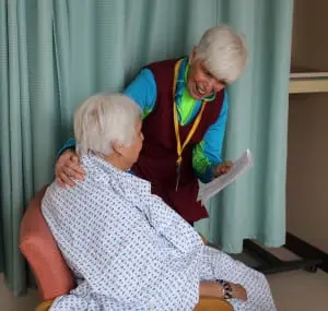 Volunteer Marianne Blume visits a patient.  
