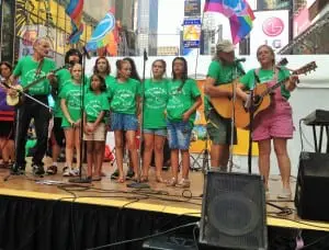 The Rivertown Kids, along with music director Travis Jeffrey, perform at the 2014 Eco-Fest in New York City.  (Photo by Tery Udell)