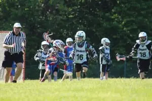 The Philipstown Highlanders third- and fourth-grade Lacrosse team defends against Carmel in a 9-4 loss. (Photo by Kim Giachinta)