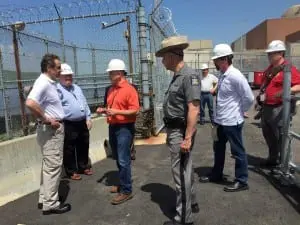 Gov. Cuomo (left) is briefed by NYSDEC Commissioner Joseph Martens at Indian Point after the May 9 incident (official photo).