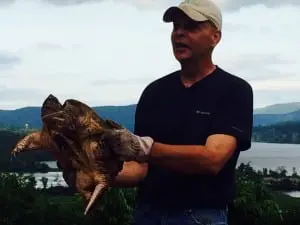 Audubon Center director Eric Lind reveals a turtle’s underside.