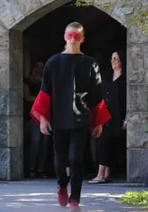 Eric Rizzi makes his way down the runway in an outfit designed by fellow student Macdara Heanue at the 2014 Fashion as Art show.