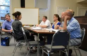 The Philipstown Town Board and Nelsonville Trustee Danielle Pack McCarthy, second from left, discussed consolidation June 10; Town Board members, from right: Councilor John Van Tassel, Supervisor Richard Shea, and Councilors Nancy Montgomery, Robert Flaherty, and Mike Leonard. Photo by L.S. Armstrong 