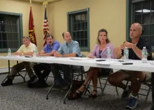 Meeting at the Garrison firehouse, the Philipstown Town Board holds a public hearing on the issue of creating a Garrison fire district; from left: Councilors Robert Flaherty and Mike Leonard, Supervisor Richard Shea, Councilors Nancy Montgomery and John Van Tassel.