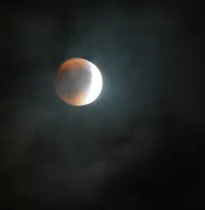 The "blood moon" eclipse hung in the sky over Main Street, Cold Spring, Sunday night. (Photo by L.S. Armstrong)