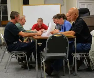 Fromâleft,âGarrisonâVolunteerâFireâCompanyâ1stâLt.âLeeâEricksonâandâChiefâJimâEricksonâpresentâtheâcompany'sâproposedâ2016âbudgetâtoâtheâTownâBoard.â(PhotoâbyâL.S.âArmstrong) 
