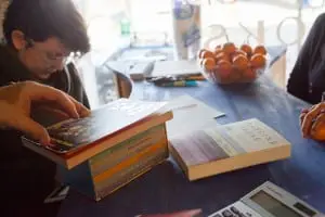 Annmarie Nye tallies a shopper's impressive haul (Photo by Michael Berlin) 