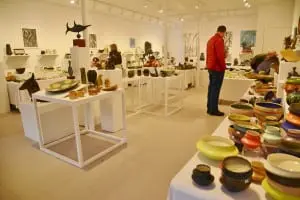 Pottery and other goods fill the Garrison Art Center for the holiday sale. Photo by L.S. Armstrong 