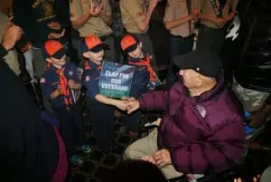 A veteran is thanked by a group of Boy Scouts at last year's dinner (photo provided)