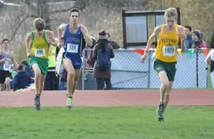 Theo Henderson races to his nine-place finish at the Class D state championship on Nov. 14. (Photo by Peter Farrell)