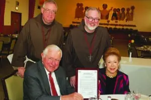 The Rev. James Loughran, vicar general and the Very Rev. Brian F. Terry, minister general, with John J. Conheeney and Mary Higgins Clark Conheeney (photo provided)