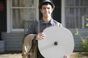  Mr. Antrobus invents the wheel. 'Friday cast' member Theo Henderson (Photo by Jim Mechalakos) 