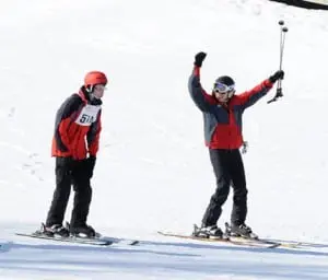 A skiing competitor and guide (photo provided)