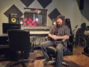 Mike Usifer at the boards of Beacon Soundworks, which will celebrate its grand opening on April 9. (Photo by B. Cronin)