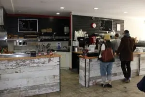 Open only a few weeks, Stock Up already has its regulars. (Photo by A. Rooney) 