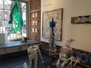 Delphine's dog, daughter and some of her furniture at Gallery 66 NY (photo provided) 