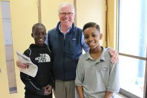 San Miguel Academy volunteer Nat Prentice, with two students (Photo by A. Rooney)