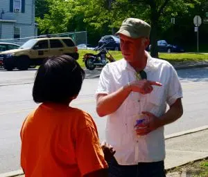 George Mansfield speaking with a constituent (photo by J. Simms)