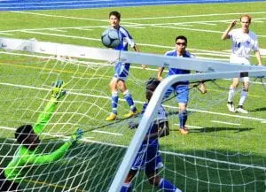 Haldane's Seth Warren (14) watches as his shot sails just below the crossbar to put the Blue Devils up 2-0 against Yonkers Montessori Academy Sept. 10.(Photo by Peter Farrell)