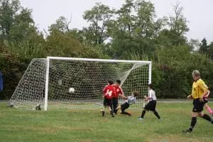 Trajan McCarthy scores one of his two goals on Oct. 2 for the Philipstown Soccer Club's U11 Strikers (Photo by Patrice Delabie)