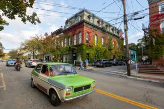 Cristian Chironi drives passengers down Main Street in Cold Spring on Oct. 16.