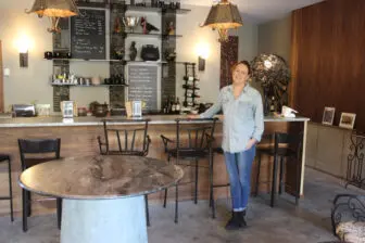 Chloe Lecash, who manages Cro' Nest, at its bar