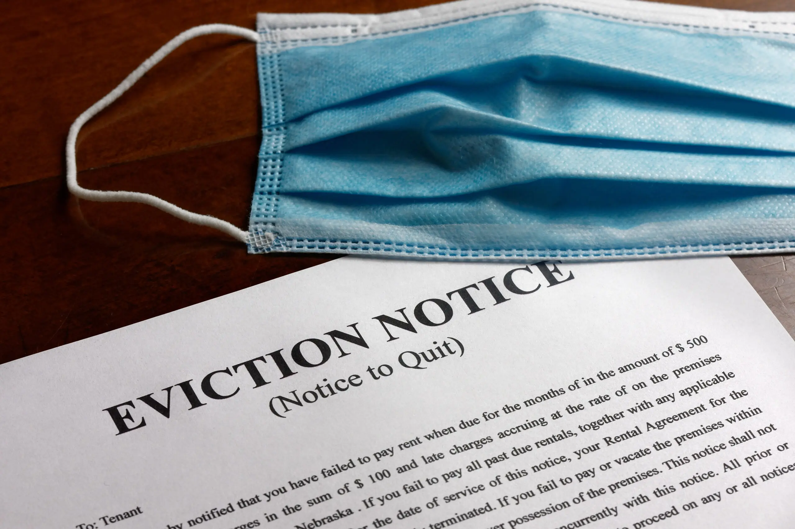 facial or surgical mask on top of the eviction note