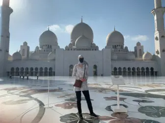 Gwendolyn Bounds stands outside the Sheikh Zayed Grand Mosque in Abu Dhabi, one of the world’s largest mosques. Female visitors must wear head coverings.