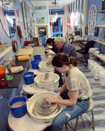 Rachel Miller, Bob Rogers and Jill Facko work during a class.
